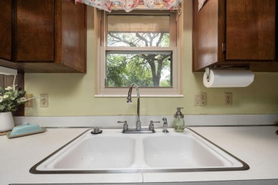Welcome home to this beautiful, brick single-story 4 bedroom/2 on Fort Walton Beach Golf Course in Florida - for sale on GolfHomes.com, golf home, golf lot
