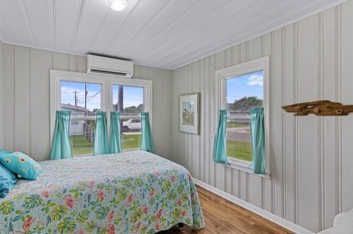 Ride your golf cart to dining, the beach, and downtown from this on Rockport Country Club in Texas - for sale on GolfHomes.com, golf home, golf lot