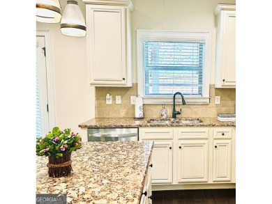 This home has it all! Situated on a beautifully landscaped level on Chateau Elan Golf Club  in Georgia - for sale on GolfHomes.com, golf home, golf lot