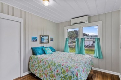 Ride your golf cart to dining, the beach, and downtown from this on Rockport Country Club in Texas - for sale on GolfHomes.com, golf home, golf lot