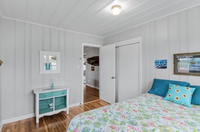 Ride your golf cart to dining, the beach, and downtown from this on Rockport Country Club in Texas - for sale on GolfHomes.com, golf home, golf lot