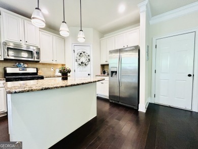 This home has it all! Situated on a beautifully landscaped level on Chateau Elan Golf Club  in Georgia - for sale on GolfHomes.com, golf home, golf lot