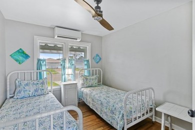 Ride your golf cart to dining, the beach, and downtown from this on Rockport Country Club in Texas - for sale on GolfHomes.com, golf home, golf lot