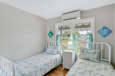 Ride your golf cart to dining, the beach, and downtown from this on Rockport Country Club in Texas - for sale on GolfHomes.com, golf home, golf lot