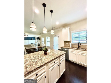 This home has it all! Situated on a beautifully landscaped level on Chateau Elan Golf Club  in Georgia - for sale on GolfHomes.com, golf home, golf lot