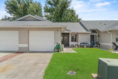 The best of both worlds, this sweet villa is easy to maintain on Sandpiper Golf Club in Florida - for sale on GolfHomes.com, golf home, golf lot