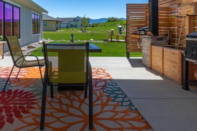 This beautifully finished 3-bedroom, 2.5-bath home in The Powder on The Powder Horn Golf Club - Mountain in Wyoming - for sale on GolfHomes.com, golf home, golf lot