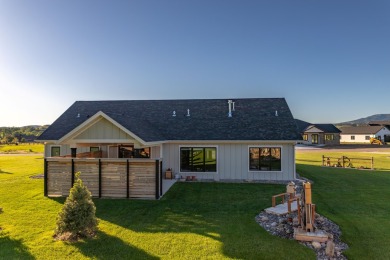 This beautifully finished 3-bedroom, 2.5-bath home in The Powder on The Powder Horn Golf Club - Mountain in Wyoming - for sale on GolfHomes.com, golf home, golf lot