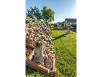 This beautifully finished 3-bedroom, 2.5-bath home in The Powder on The Powder Horn Golf Club - Mountain in Wyoming - for sale on GolfHomes.com, golf home, golf lot