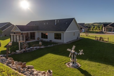 This beautifully finished 3-bedroom, 2.5-bath home in The Powder on The Powder Horn Golf Club - Mountain in Wyoming - for sale on GolfHomes.com, golf home, golf lot