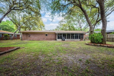Welcome home to this beautiful, brick single-story 4 bedroom/2 on Fort Walton Beach Golf Course in Florida - for sale on GolfHomes.com, golf home, golf lot