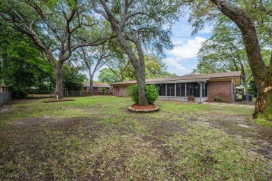 Welcome home to this beautiful, brick single-story 4 bedroom/2 on Fort Walton Beach Golf Course in Florida - for sale on GolfHomes.com, golf home, golf lot