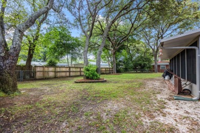 Welcome home to this beautiful, brick single-story 4 bedroom/2 on Fort Walton Beach Golf Course in Florida - for sale on GolfHomes.com, golf home, golf lot