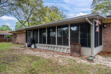 Welcome home to this beautiful, brick single-story 4 bedroom/2 on Fort Walton Beach Golf Course in Florida - for sale on GolfHomes.com, golf home, golf lot
