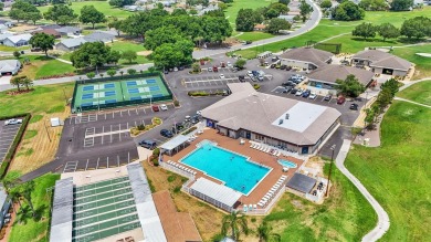 The best of both worlds, this sweet villa is easy to maintain on Sandpiper Golf Club in Florida - for sale on GolfHomes.com, golf home, golf lot