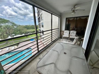 2-bedroom 2-bathroom condo located in the sought out all age's on Palm-Aire Country Club and Resort - Palms in Florida - for sale on GolfHomes.com, golf home, golf lot