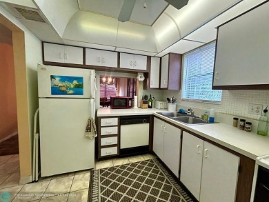 2-bedroom 2-bathroom condo located in the sought out all age's on Palm-Aire Country Club and Resort - Palms in Florida - for sale on GolfHomes.com, golf home, golf lot