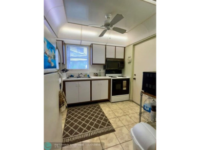 2-bedroom 2-bathroom condo located in the sought out all age's on Palm-Aire Country Club and Resort - Palms in Florida - for sale on GolfHomes.com, golf home, golf lot