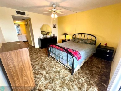 2-bedroom 2-bathroom condo located in the sought out all age's on Palm-Aire Country Club and Resort - Palms in Florida - for sale on GolfHomes.com, golf home, golf lot