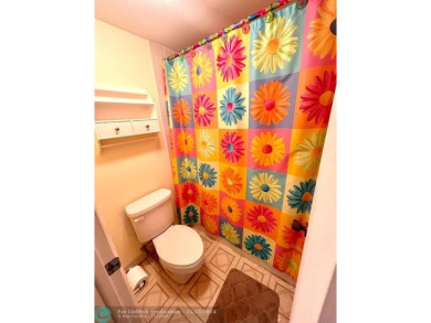 2-bedroom 2-bathroom condo located in the sought out all age's on Palm-Aire Country Club and Resort - Palms in Florida - for sale on GolfHomes.com, golf home, golf lot