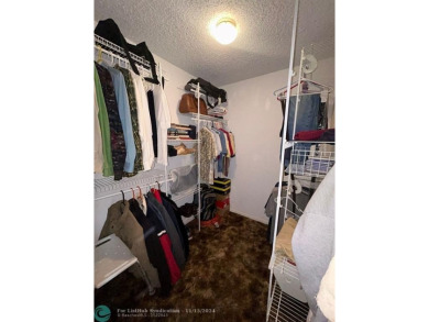 2-bedroom 2-bathroom condo located in the sought out all age's on Palm-Aire Country Club and Resort - Palms in Florida - for sale on GolfHomes.com, golf home, golf lot