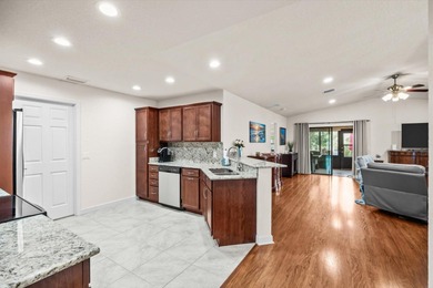 Located in the desirable Spanish Lakes 55+ community, this on Spanish Lakes Country Club in Florida - for sale on GolfHomes.com, golf home, golf lot