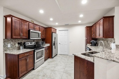 Located in the desirable Spanish Lakes 55+ community, this on Spanish Lakes Country Club in Florida - for sale on GolfHomes.com, golf home, golf lot