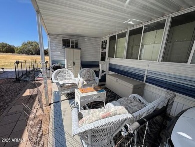 Retirement living at its best. Gated community, Club House with on Juniper Ridge R.V. Golf Resort in Arizona - for sale on GolfHomes.com, golf home, golf lot