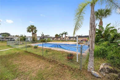 PRICE IMPROVEMENT! Your Waterfront Oasis awaits with this Canal on Plantation Inn and Golf Resort  in Florida - for sale on GolfHomes.com, golf home, golf lot