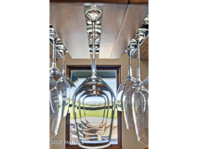 Luxury estate nestled at the end of a cul-de-sac and backing on Antelope Hills Golf Courses in Arizona - for sale on GolfHomes.com, golf home, golf lot