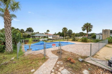 PRICE IMPROVEMENT! Your Waterfront Oasis awaits with this Canal on Plantation Inn and Golf Resort  in Florida - for sale on GolfHomes.com, golf home, golf lot