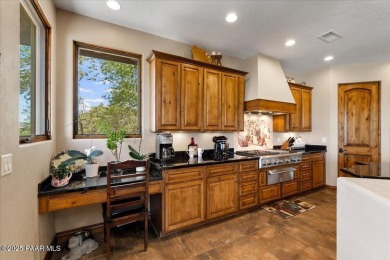 Luxury estate nestled at the end of a cul-de-sac and backing on Antelope Hills Golf Courses in Arizona - for sale on GolfHomes.com, golf home, golf lot