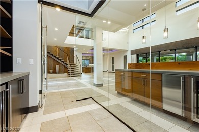 Nestled in The Ridges, 94 Glade Hallow doesn't skimp on luxury on Bears Best Las Vegas Golf Club in Nevada - for sale on GolfHomes.com, golf home, golf lot