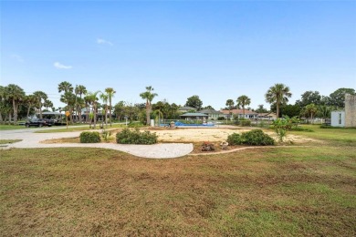 PRICE IMPROVEMENT! Your Waterfront Oasis awaits with this Canal on Plantation Inn and Golf Resort  in Florida - for sale on GolfHomes.com, golf home, golf lot