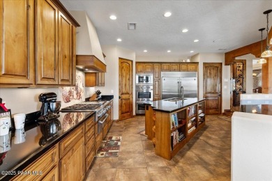 Luxury estate nestled at the end of a cul-de-sac and backing on Antelope Hills Golf Courses in Arizona - for sale on GolfHomes.com, golf home, golf lot