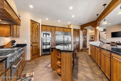 Luxury estate nestled at the end of a cul-de-sac and backing on Antelope Hills Golf Courses in Arizona - for sale on GolfHomes.com, golf home, golf lot