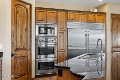 Luxury estate nestled at the end of a cul-de-sac and backing on Antelope Hills Golf Courses in Arizona - for sale on GolfHomes.com, golf home, golf lot