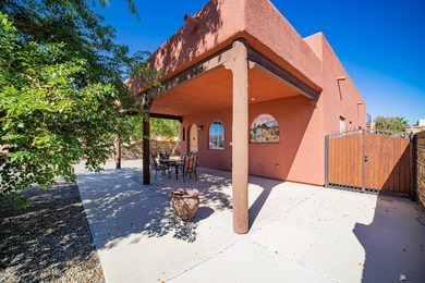 Tucked away in Yuma's South Foothills, this Santa Fe-style home on Las Barrancas Golf Course in Arizona - for sale on GolfHomes.com, golf home, golf lot