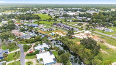 PRICE IMPROVEMENT! Your Waterfront Oasis awaits with this Canal on Plantation Inn and Golf Resort  in Florida - for sale on GolfHomes.com, golf home, golf lot