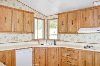 Welcome Home to 10765 Chisholm Trail in Cherry Valley! If you're on Highland Springs Village Golf Course in California - for sale on GolfHomes.com, golf home, golf lot