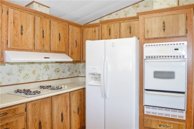 Welcome Home to 10765 Chisholm Trail in Cherry Valley! If you're on Highland Springs Village Golf Course in California - for sale on GolfHomes.com, golf home, golf lot