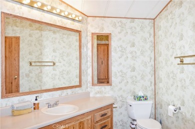 Welcome Home to 10765 Chisholm Trail in Cherry Valley! If you're on Highland Springs Village Golf Course in California - for sale on GolfHomes.com, golf home, golf lot