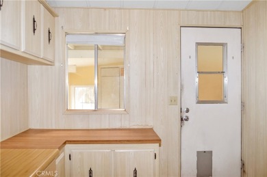 Welcome Home to 10765 Chisholm Trail in Cherry Valley! If you're on Highland Springs Village Golf Course in California - for sale on GolfHomes.com, golf home, golf lot