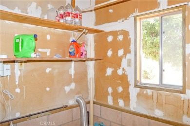 Welcome Home to 10765 Chisholm Trail in Cherry Valley! If you're on Highland Springs Village Golf Course in California - for sale on GolfHomes.com, golf home, golf lot