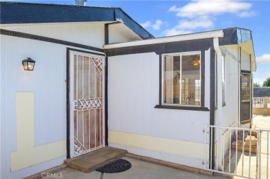 Welcome Home to 10765 Chisholm Trail in Cherry Valley! If you're on Highland Springs Village Golf Course in California - for sale on GolfHomes.com, golf home, golf lot