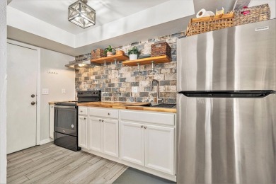 PRICE CORRECTION!!! Sleek  Sophisticated 2-Bed, 1.5-Bath on Cove Cay Country Club in Florida - for sale on GolfHomes.com, golf home, golf lot