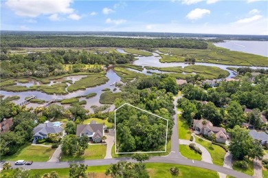 Nestled on a corner lot in the sought-after Oak Grove Island on Oak Grove Island Golf and Country Club in Georgia - for sale on GolfHomes.com, golf home, golf lot