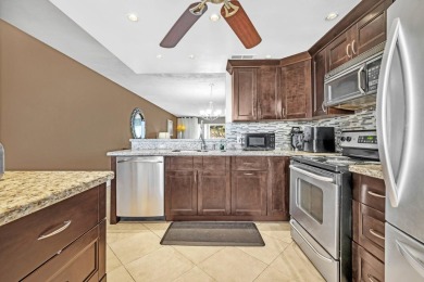 Updated and furnished 2 bed/2 bath unit. Open kitchen, shaker on Wynmoor Golf Course in Florida - for sale on GolfHomes.com, golf home, golf lot