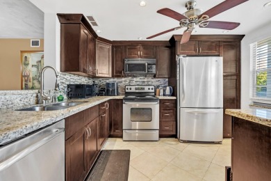 Updated and furnished 2 bed/2 bath unit. Open kitchen, shaker on Wynmoor Golf Course in Florida - for sale on GolfHomes.com, golf home, golf lot