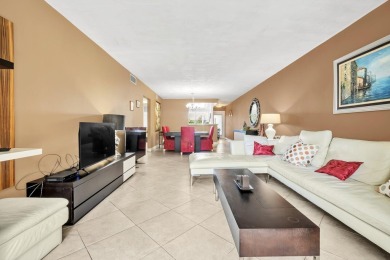 Updated and furnished 2 bed/2 bath unit. Open kitchen, shaker on Wynmoor Golf Course in Florida - for sale on GolfHomes.com, golf home, golf lot